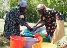 African Women Washing Dishes African Women Washing Dishes